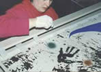 Conservatiion taping Miro' silkscreen 